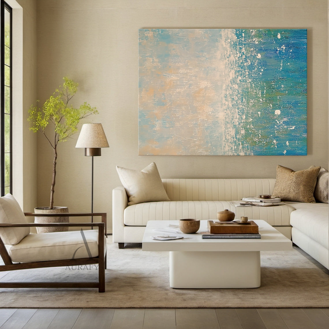 Abstract Beige Blue Impasto Artwork AURA405 Japandi Living Room Installation Display, the piece is mounted on a warm off-white accent wall above a light oak low sideboard, its soft upper gradients of pale blue and muted beige harmonize seamlessly with the surrounding neutral-toned soft furnishings and light wood decor, the lower layered blue tones ranging from bright sky blue to deep teal bring a quiet fresh coastal feeling to the space, the thick textured impasto strokes show distinct tactile layering unde
