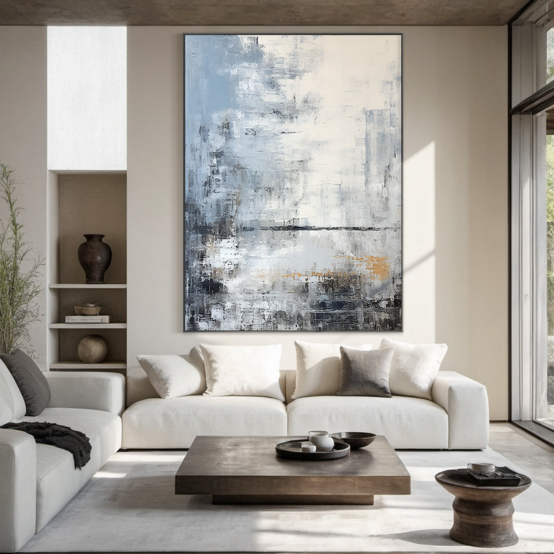 Modern abstract blue geometric wall art with textured brushwork: shades of gray-blue, cobalt, white, gray, black, and subtle warm orange accents. Features abstract blocks and thick impasto texture. Displayed above a beige fabric bed in a Nordic-style bedroom—perfect focal point for minimalist, Nordic, or modern home decor. Ready-to-hang with a sleek black aluminum frame and premium waterproof canvas.