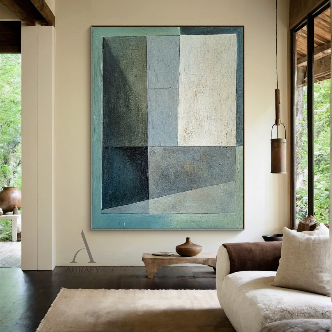 Geometric abstract hand-painted oil painting with distinct tactile brushstroke texture, composed of irregular rectangular and asymmetrical color blocks in layered light green, dark green, warm beige, muted gray-blue, dark gray and light gray. Blocks are separated by clear straight and slanted lines, features a low-saturation earthy color palette and well-balanced visual layout, conveys a minimalist calm aesthetic, this display shot shows it hung above the solid wood headboard of a minimalist bedroom, and it