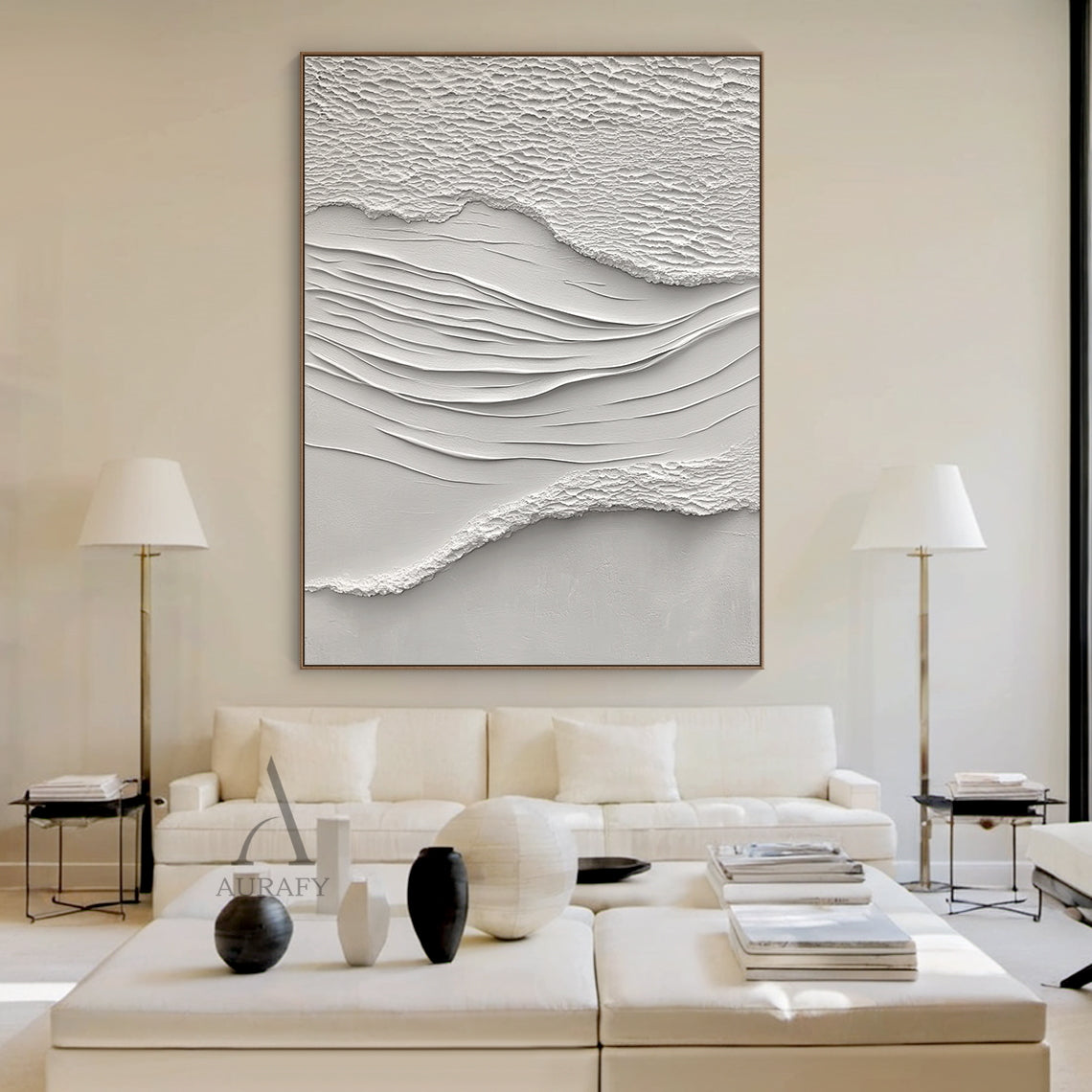 White Sea Textured High-Relief Plaster Artwork (AURA443): Abstract ocean-inspired piece with rough foam/sand-like textured edges, smooth flowing wave lines, monochromatic ivory-off white palette. Tactile 3D surface ideal for serene bedroom headboard walls, minimalist entryway accents, cozy reading nook centerpieces, or bright sunlit kitchen backsplash areas. Complements neutral decor and natural light.