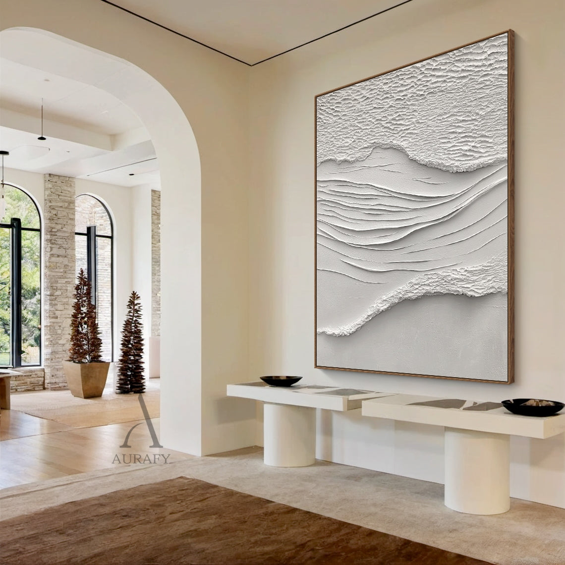 White Sea Textured High-Relief Plaster Artwork (AURA443): Abstract ocean-inspired piece with rough foam/sand-like textured edges, smooth flowing wave lines, monochromatic ivory-off white palette. Tactile 3D surface ideal for elegant living room sofa backdrop walls, sleek hallway end accents, tranquil study desk above decor, or airy sunlit terrace feature walls. Complements warm wood decor and soft ambient light.