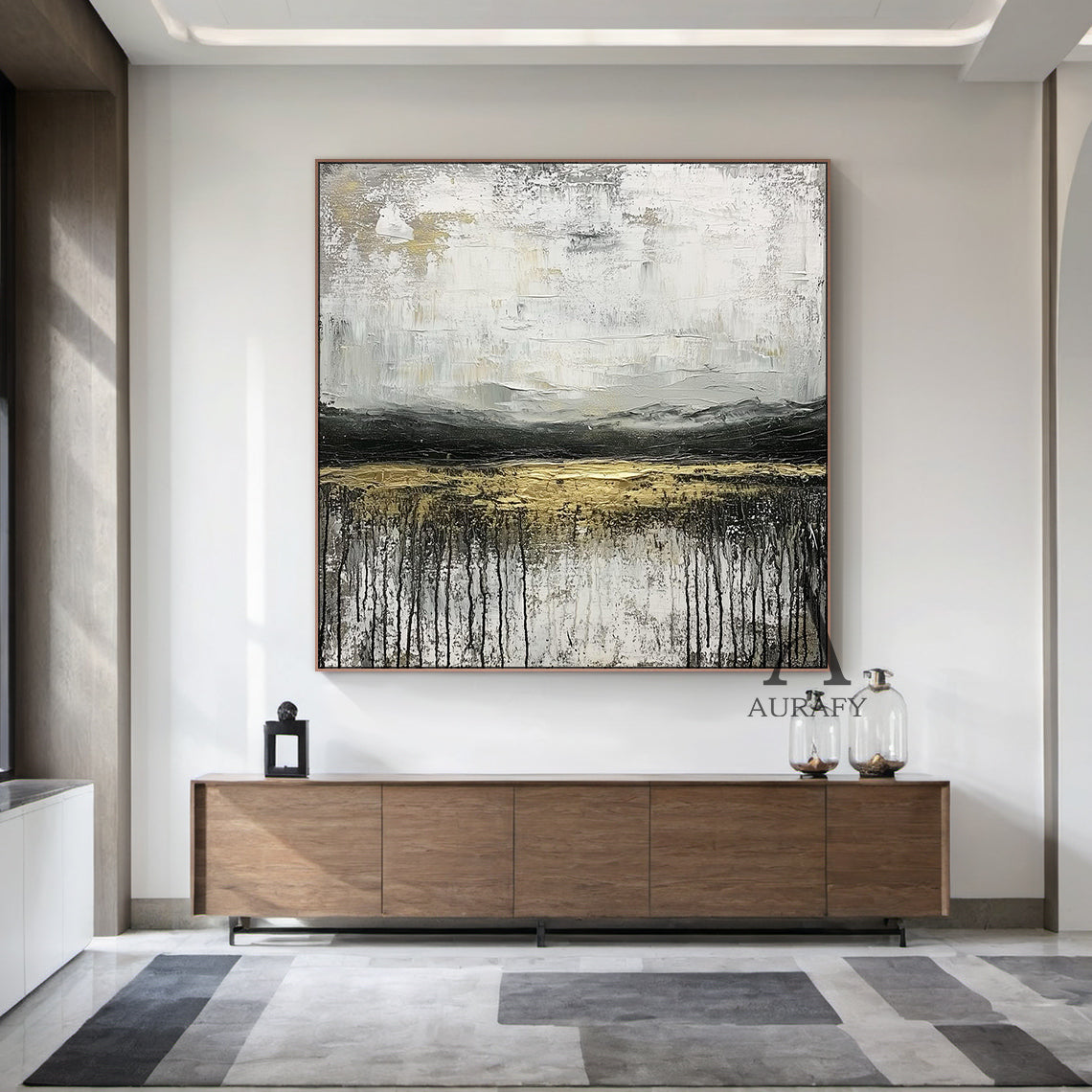 Minimalist Modern General Abstract Wall Art AURA253 - 3D impasto texture with vertical drips, soft white base transitioning to warm off-whites, deep black horizontal bands & shimmering gold stripe. Ideal for modern minimalist living room decor, statement focal point above a light gray linen sofa, or paired with a sleek marble coffee table. Neutral palette complements muted terracotta throw pillows, wooden accent shelves & matte black decor pieces, bringing serene elegance to contemporary cozy spaces. Hung i