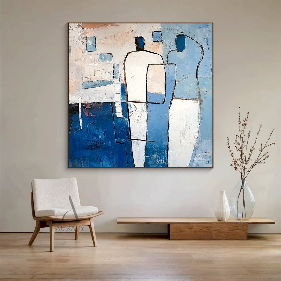 Modern Abstract Blue Art (AURA405) Living Room Scenario Display, the artwork comes with expressive tactile impasto texture, bold outlines defining two faceless stylized abstract human figures: the left figure has white upper body and deep navy lower half, the right figure presents soft light blue and white curved forms, the artwork's base background is spliced with light blue and beige geometric blocks with subtle pale orange warm accents, handcrafted brushstrokes create a dimensional 3D paint surface. This
