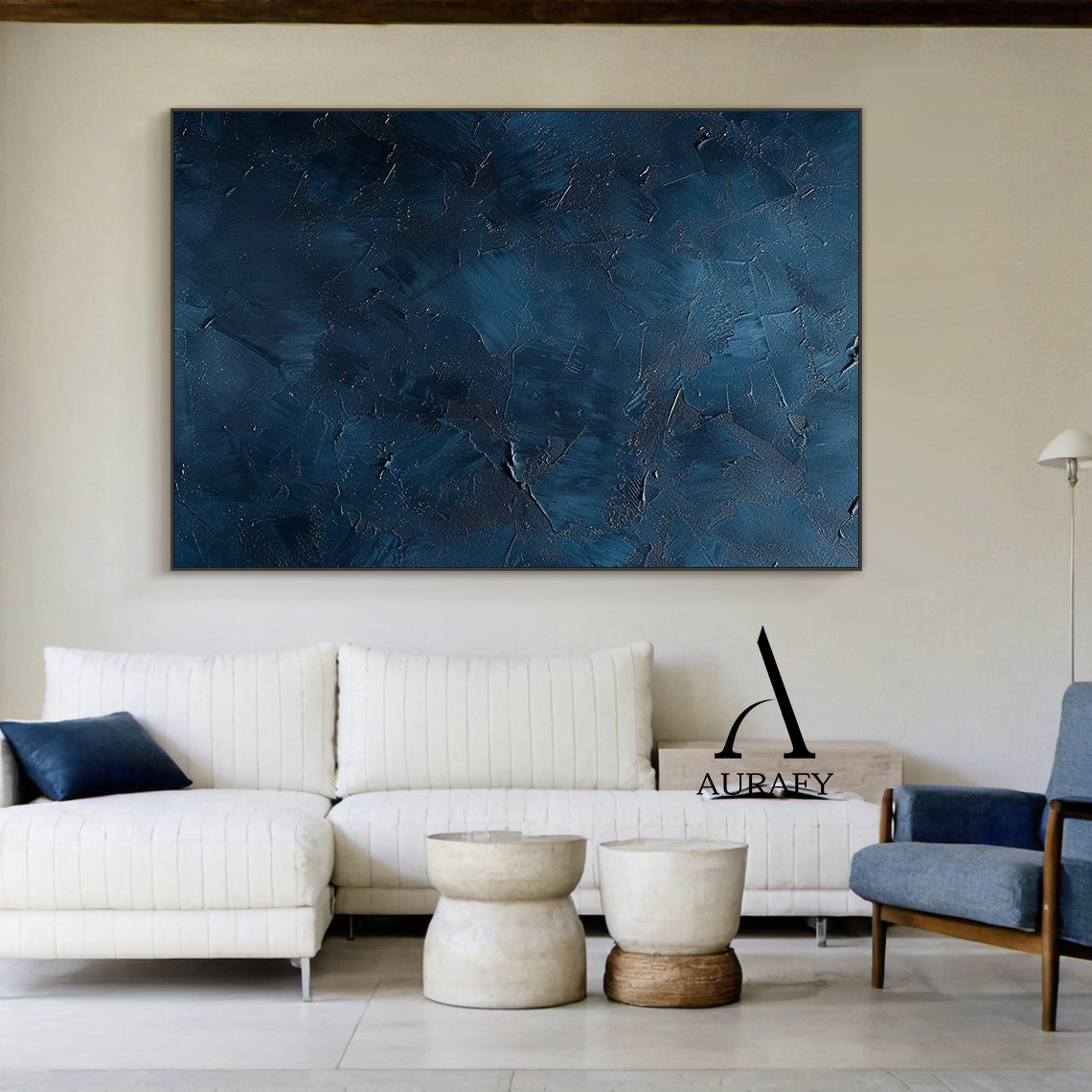 Handcrafted navy blue abstract minimalist canvas wall art, featuring thick hand-applied impasto palette knife textured surface with irregular raised scrapes, subtle metallic shimmer flecks, layered muted blue shades ranging from soft slate blue to deep midnight navy, no figurative patterns, wabi-sabi Japandi style artwork from Aurafy, ideal for modern minimalist, wabi-sabi, Japandi interior wall decor.