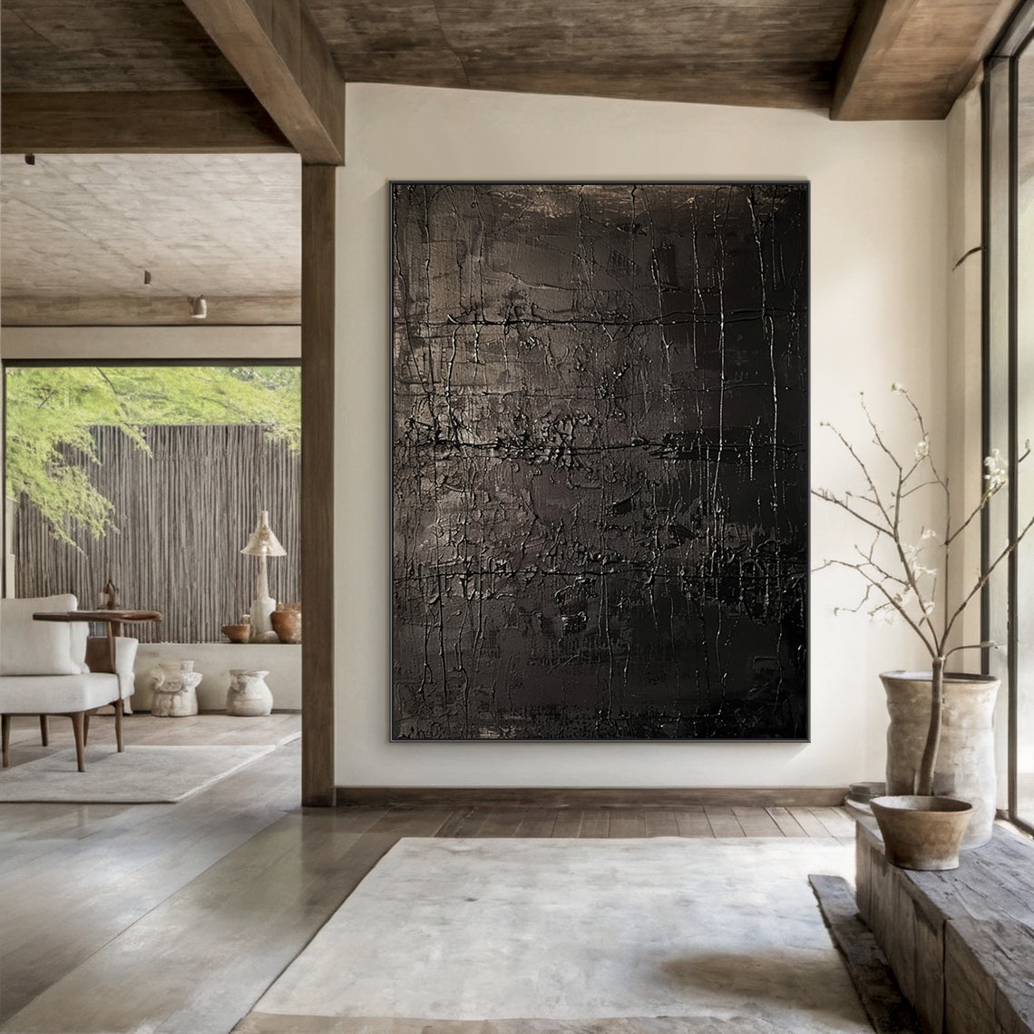Black Abstract Art Canvas Wall Art (AURA192) | Modern Wabi-Sabi Style with Impasto & Scraped Rough Tactile Textures. Focal point in a serene wabi-sabi living room featuring solid wood coffee table, linen throw pillows, terracotta planters with potted succulents, woven rattan floor lamp, and warm ambient light filtering through natural fiber curtains—ideal for infusing artistic contrast into minimalist natural interiors, harmonizing 质朴 (natural) warmth with modern artistic flair. Perfect for enhancing wabi-s