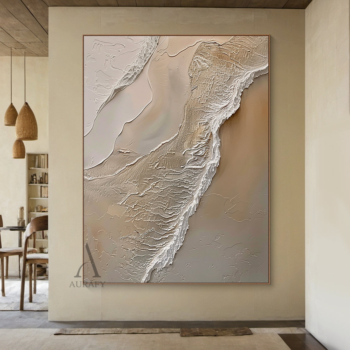 Ocean Brown Abstract Impasto Art: Tactile sculpted canvas with thick raised impasto layers of warm browns (light beige, sand tones) and wispy white lines mimicking ocean waves lapping at sunlit sand. High-relief texture creates dynamic shadows under soft ambient light. Perfect focal point for a cozy Nordic-style bedroom—above a light wood platform bed draped in cream linen bedding, flanked by woven rattan nightstands holding ceramic vases with dried pampas grass, complementing knit throw pillows and a macra
