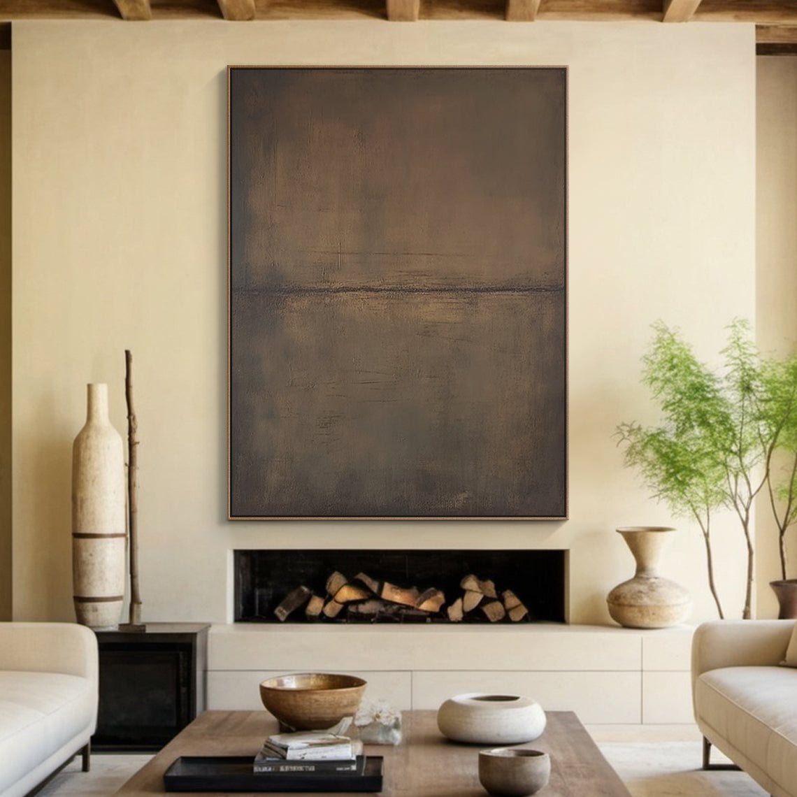 Wabi Sabi abstract wall art canvas (AURA188) with neutral brown and gray mottled tactile surface, hanging above a natural wood console table in a sunlit Japandi living room. The table displays a small potted succulent and a woven storage basket, with a linen cushion resting on a low wooden bench nearby. Soft natural light filters through sheer curtains, creating a serene earthy vibe perfect for a minimalist living space or entryway. This vertical abstract piece features organic uneven strokes and subtle war
