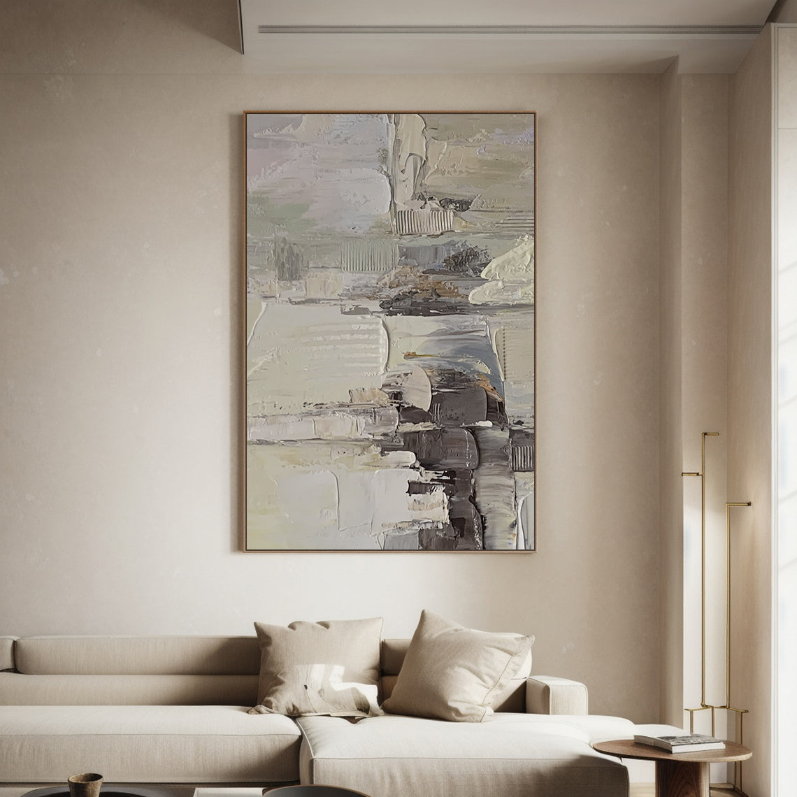 Wabi Sabi Abstract Textured Wall Art - Hand-applied impasto acrylic paint with thick, organic brushstrokes and palette knife texture. Neutral tones (beige, soft gray, off-white) with subtle pink accents, framed in natural wood. Ideal for living room, bedroom, or minimalist/bohemian/Scandinavian decor. Raised texture interacts with light—sunlight highlights brushstrokes, lamplight creates cozy ambiance. Ready to hang with pre-installed kit.