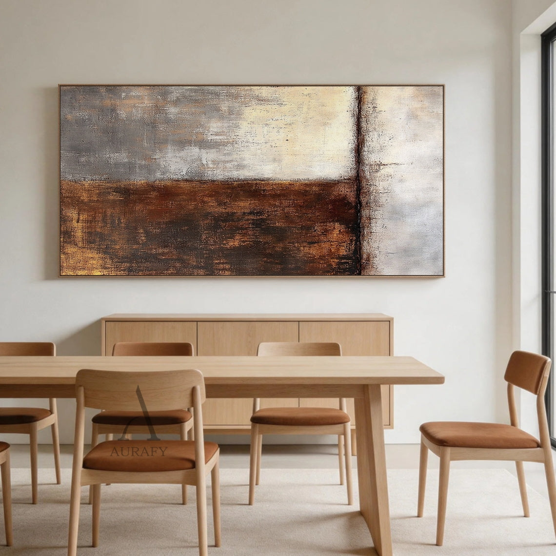 Wabi-sabi abstract wall art (AURA405) displayed above a soft gray linen headboard in a minimalist bedroom bathed in gentle natural light; split composition featuring warm brown and gold textured brushstrokes on the left, soft beige and gray tones on the right, matte finish, handcrafted uneven edges, and horizontal line accent—ideal for Japandi living rooms, minimalist bedrooms, bohemian entryways, or neutral-toned home office spaces.