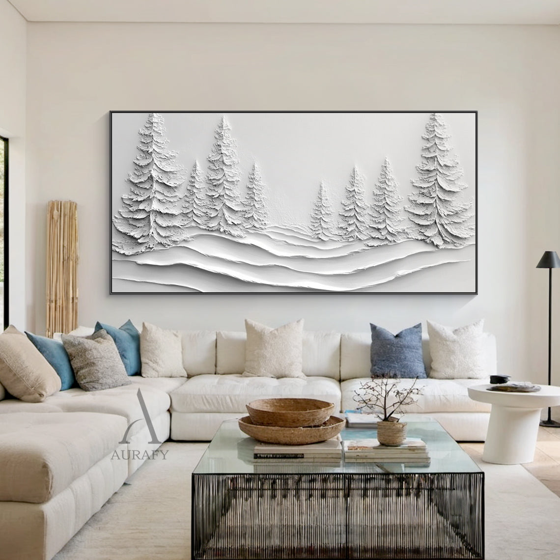 White Landscape Art (AURA457) – Minimalist modern high-relief layered 3D textured artwork featuring sculpted evergreen pine trees and undulating snowdrifts. Monochromatic white palette with subtle tonal shifts evokes serene calm, ideal for a sunlit entryway niche above a woven jute rug or beside a potted eucalyptus on a reclaimed wood shelf. Tactile surface creates dynamic light/shadow play, adding depth to warm, inviting spaces. Blends wabi-sabi simplicity with winter landscape charm, complementing soft ne