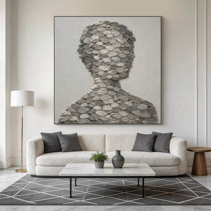 3D textured gray impasto canvas wall art AURA703, right-facing abstract human bust silhouette composed of stacked oval thick paint blobs in light, medium and dark gray tones, set against a subtly textured matte off-white background, minimalist wabi-sabi japandi abstract portrait wall decor with raised tactile finish for neutral interior spaces