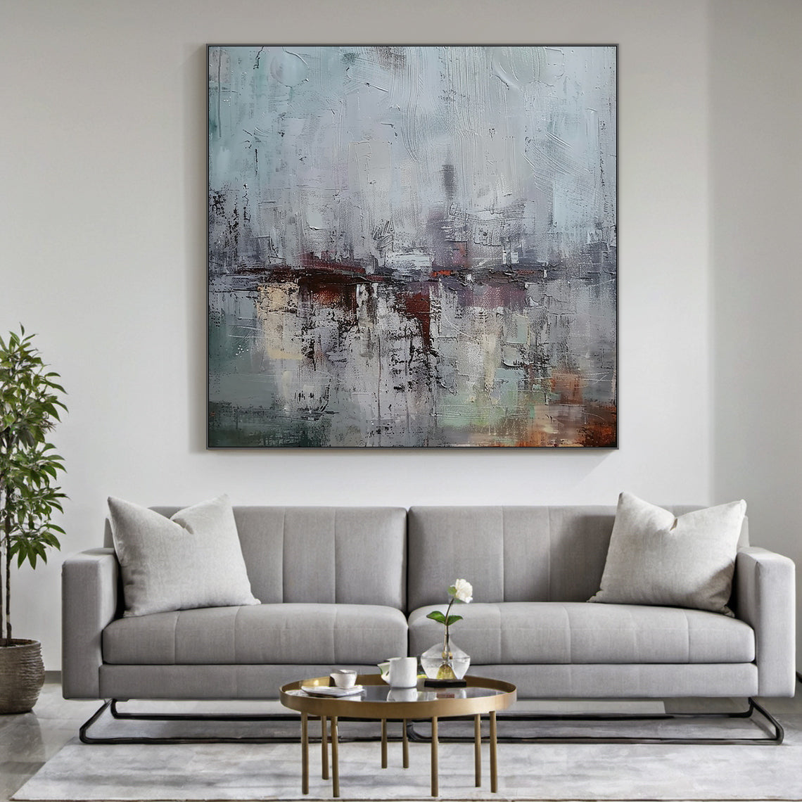 AURA229 Gray Blue Wabi Sabi Abstract Wall Art: Large Textured Canvas with Soft Gray-Blue Tones & Earthy Accents. Hanging Above Beige Linen Sofa in Minimalist Living Room, Complementing Natural Wood Coffee Table, Potted Green Plants & Warm Floor Lamp. Wabi Sabi Style Embraces Imperfection & Natural Beauty—Ideal for Living Room Wall Decor, Cozy Reading Nooks, or Bedroom Spaces. This Art Piece Adds Understated Charm to Serene Living Areas, Merging Minimalist Elegance with Rustic Warmth as Part of the AURA229 W