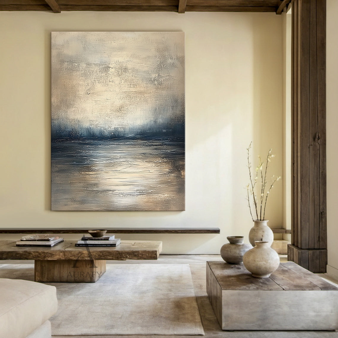 Abstract beige blue wall art (AURA405) with knife stroke textured surface, horizontal layered composition evokes calm water surface, distant shoreline and misty hazy sky in sequence, soft transition between light beige, gray beige, deep blue and gray blue tones, handcrafted thick paint texture delivers serene tranquil natural vibe, fits minimalist, Japandi and modern organic home decor.