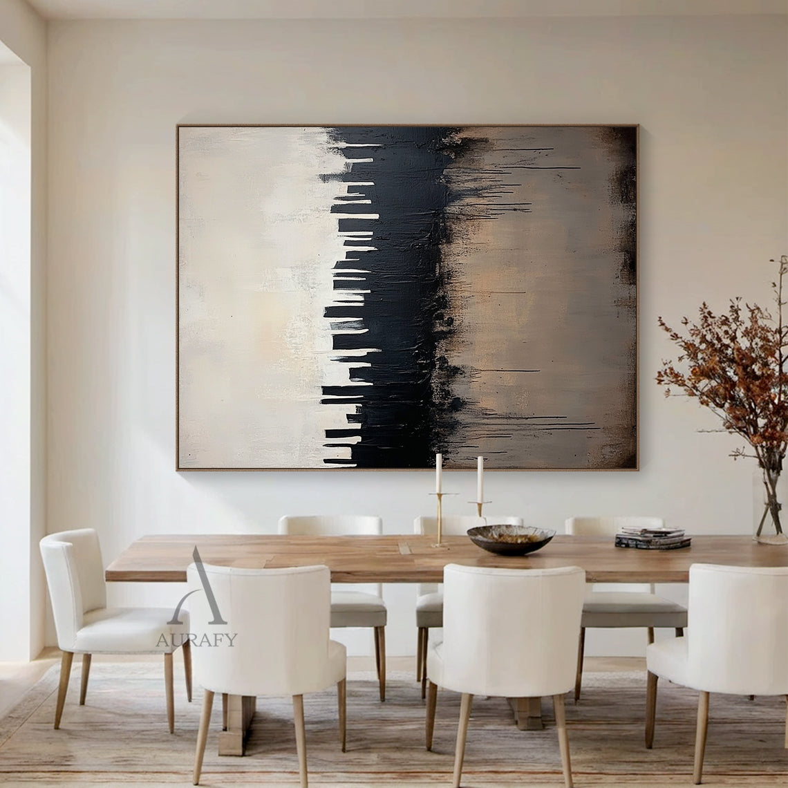 Abstract black and beige city skyline wall art styled in a soft neutral minimalist home interior scene, heavy impasto thick brushstrokes form bold black urban skyscraper silhouettes against a muted pale off-white gradient background, intentional black paint drips cascade over the textured warm beige lower area simulating city water reflection, tactile minimalist luxe abstract artwork hung on a light oat-colored wall to show its matching effect for modern Japandi and minimalist home decor.