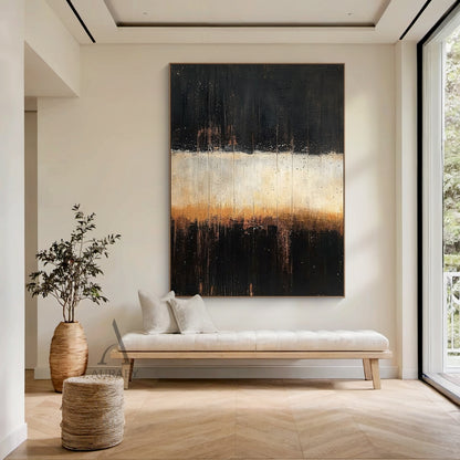 Abstract Black Beige Minimalist Expressionist Canvas Art AURA405, real home hanging display version, retains the classic horizontal layered structure with deep black sections (with subtle brown undertones and tiny paint speckles) on the top and bottom, the central beige to warm light brown gradient band is still the core visual focus, vertical knife stroke and paint drip textures run through the whole canvas, intuitively presents its harmonious matching effect with plain soft furnishings, fitting neutral ho