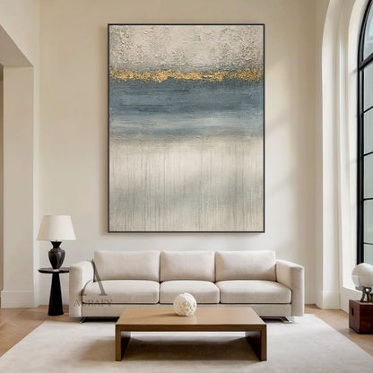General abstract gray blue plaster textured wall art (AURA405) with horizontal layered composition: top rough thick impasto light gray plaster texture, middle irregular textured gold accent band as visual focal point, followed by gradient blue section with horizontal brushstrokes, bottom light gray layer with vertical dripping texture. Modern organic wabi-sabi style artwork, perfect for Japandi, minimalist, luxury modern living room, bedroom, office wall decor.