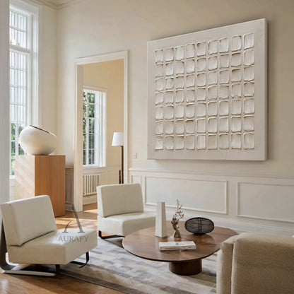 Beige Abstract High-Relief Plaster Wall Art: 7x9 Grid of Hand-Applied Textured Squares with Irregular Edges. Tactile Minimalist Decor Perfect for Sunlit Minimalist Entryway, Modern Home Office Nook, Cozy Neutral Bedroom, or Above a Wooden Console Table in Wabi-Sabi Inspired Interiors. Warm Muted Beige Tones (Soft Cream, Warm Sand) with Organic Imperfection & Wabi-Sabi Influence.