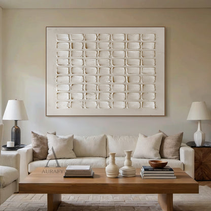 Beige Abstract High-Relief Plaster Wall Art: 7x9 Grid of Hand-Applied Textured Squares with Irregular Edges. Tactile Minimalist Decor Perfect for Sunlit Minimalist Entryway, Modern Home Office Nook, Cozy Neutral Bedroom, or Above a Wooden Console Table in Wabi-Sabi Inspired Interiors. Warm Muted Beige Tones (Soft Cream, Warm Sand) with Organic Imperfection & Wabi-Sabi Influence.