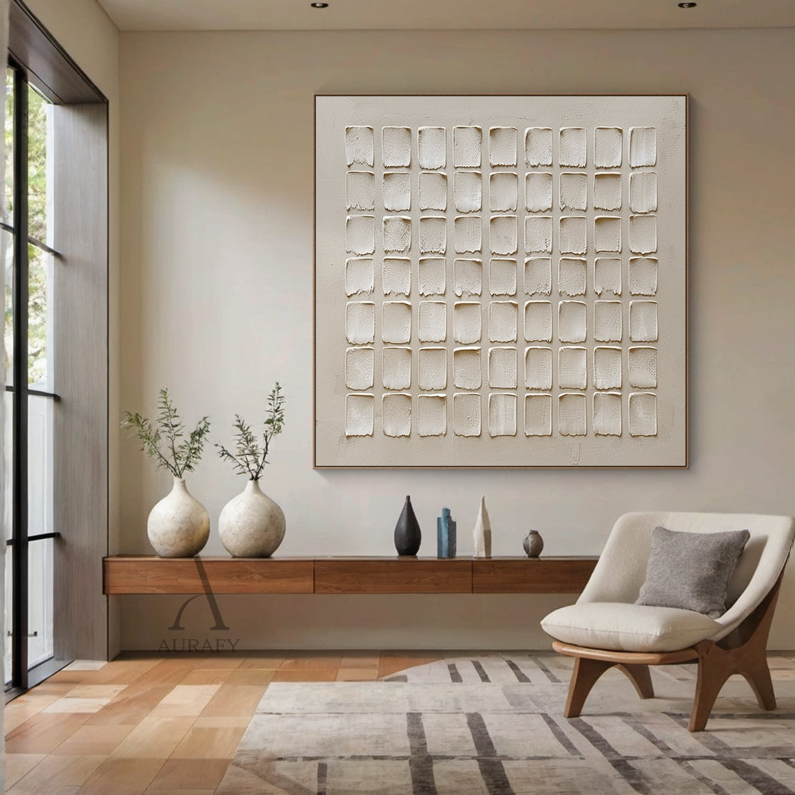 Beige Abstract High-Relief Plaster Wall Art: 7x9 Grid of Hand-Applied Textured Squares with Irregular Edges. Tactile Minimalist Decor Perfect for Above a Light Linen Sofa in a Nordic Living Room, Beside a Slender Floor Lamp in a Japanese Minimalist Tea Room, or Against a Warm Wood Paneled Wall in a Contemporary Dining Area. Warm Muted Beige Tones (Soft Cream, Warm Sand) with Organic Imperfection & Wabi-Sabi Influence.
