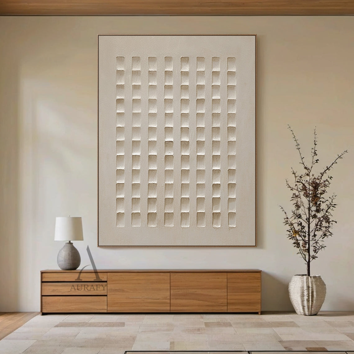 AurafyArt AURA633 abstract beige plaster wall art, monochromatic warm muted beige tone, features high-relief structured grid design with 8 neat vertical columns of recessed square blocks, has subtle cement-like textured plaster surface, light casts soft shifting shadows on the concave-convex details, modern minimalist wabi-sabi general abstract decorative artwork for Japandi and minimalist interior spaces.