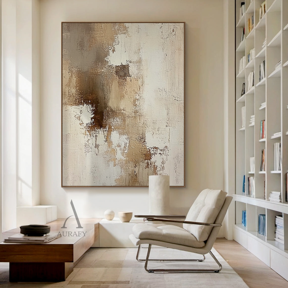 AURA634 abstract beige textured canvas wall art home display shot, the artwork is installed on a light plain wall to present its real decorative effect in actual space. It features a neutral palette of soft beige, layered varying tan brown shades and warm off-white with gentle color transitions. The surface has clear handcrafted texture with visible thick impasto, scratch, and paint stacking brush strokes, blending uneven paint texture with canvas base texture. It has no specific figurative elements, compos