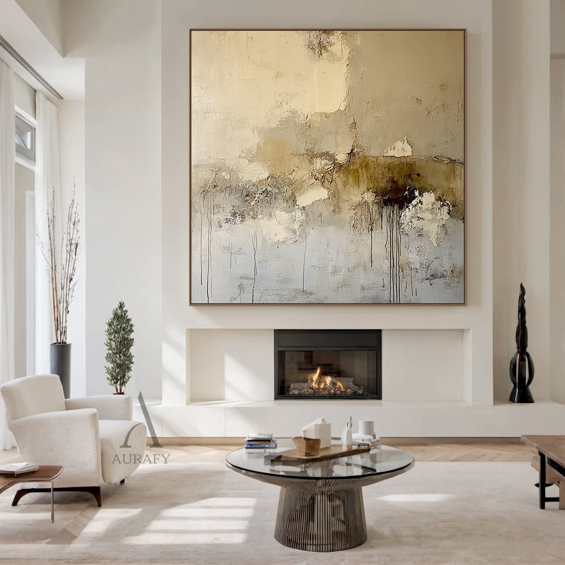 Beige abstract textured canvas wall art AURA405 [dining area real home scene display], with the original neutral palette including off-white, light beige, warm taupe and tiny deep brown accents. All characteristic textured details are fully presented: scratch marks on light beige areas, pigment stacking & peeling edges, vertical dark brown paint drips on lower right. No figurative elements, wabi-sabi japandi style, shown hung on the wall above the solid wood sideboard in a warm minimalist dining space, whic