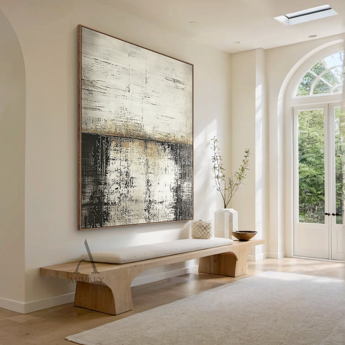 General Abstract Beige Gray Distressed Minimalist Wall Art AURA631, real home scene display hanging on the light cream textured entryway accent wall above a solid oak entry console table in a Nordic minimalist home, soft warm overhead downlight clearly presents the artwork’s upper section with light gray and warm beige horizontal parallel scratch knife strokes, middle part with mottled seamless beige-gray gradient transition, lower area with deep near-dark gray irregular vertical lines and peeling worn text