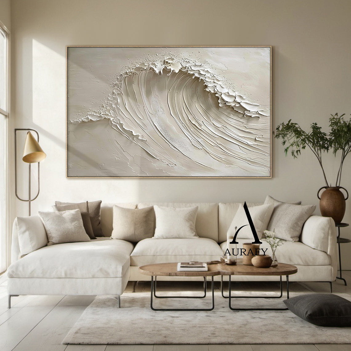 AURAFY beige monochrome high relief impasto canvas wall art mounted on a warm oak accent wall in a sunlit Japandi style bedroom, handcrafted with thick sculpted plaster/heavy acrylic texture to present a vivid rolling cresting sea wave. Multi-layered raised strokes form the soft flowing curve of the wave body, ragged uneven raised edges at the top simulate the foamy splashing of breaking surf, paired with a smooth matte warm beige background. The 3D textured surface produces natural varied light and shadow 