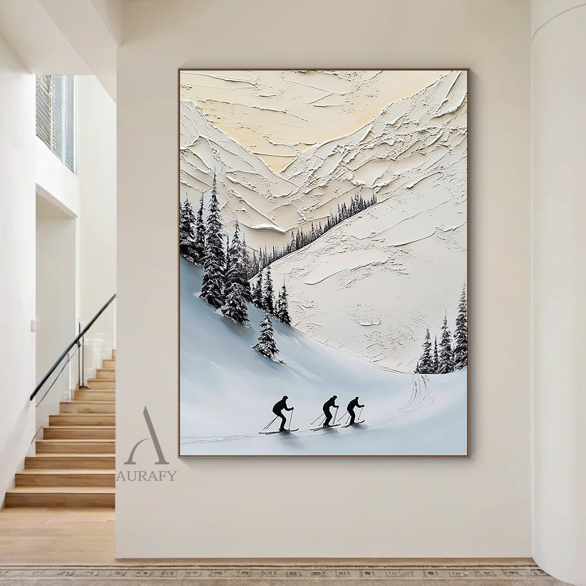 Impasto knife textured winter alpine ski landscape canvas wall art, with clear pale ice-blue sunny winter sky at the top as background. Thick raised paint strokes sculpt sunlit rounded snow-capped mountain ridges, distinct groomed snowcat treads and scattered deep ski tracks interlaced on the smooth sloping snow surface. Dense clusters of dark snow-laden spruces line the edges of the switchback ski trail, 3 black skier silhouettes weaving downhill along the winding snow path at intervals. It adopts a low-sa