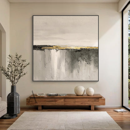 Hand-painted beige general abstract impasto canvas wall art AURA718, upper section is soft warm off-white and light beige with subtle thick paint grain texture, central horizontal matte charcoal stripe is accented with raised grainy metallic gold thick paint band as focal point, lower area is gradient gray from light beige gray to dark charcoal with vertical sweeping brushstrokes, natural cracked rough texture, wabi-sabi japandi minimalist style for neutral home space decoration