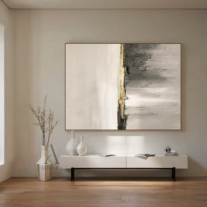 Hand-painted beige general abstract impasto canvas wall art AURA718, upper section is soft warm off-white and light beige with subtle thick paint grain texture, central horizontal matte charcoal stripe is accented with raised grainy metallic gold thick paint band as focal point, lower area is gradient gray from light beige gray to dark charcoal with vertical sweeping brushstrokes, natural cracked rough texture, wabi-sabi japandi minimalist style for neutral home space decoration