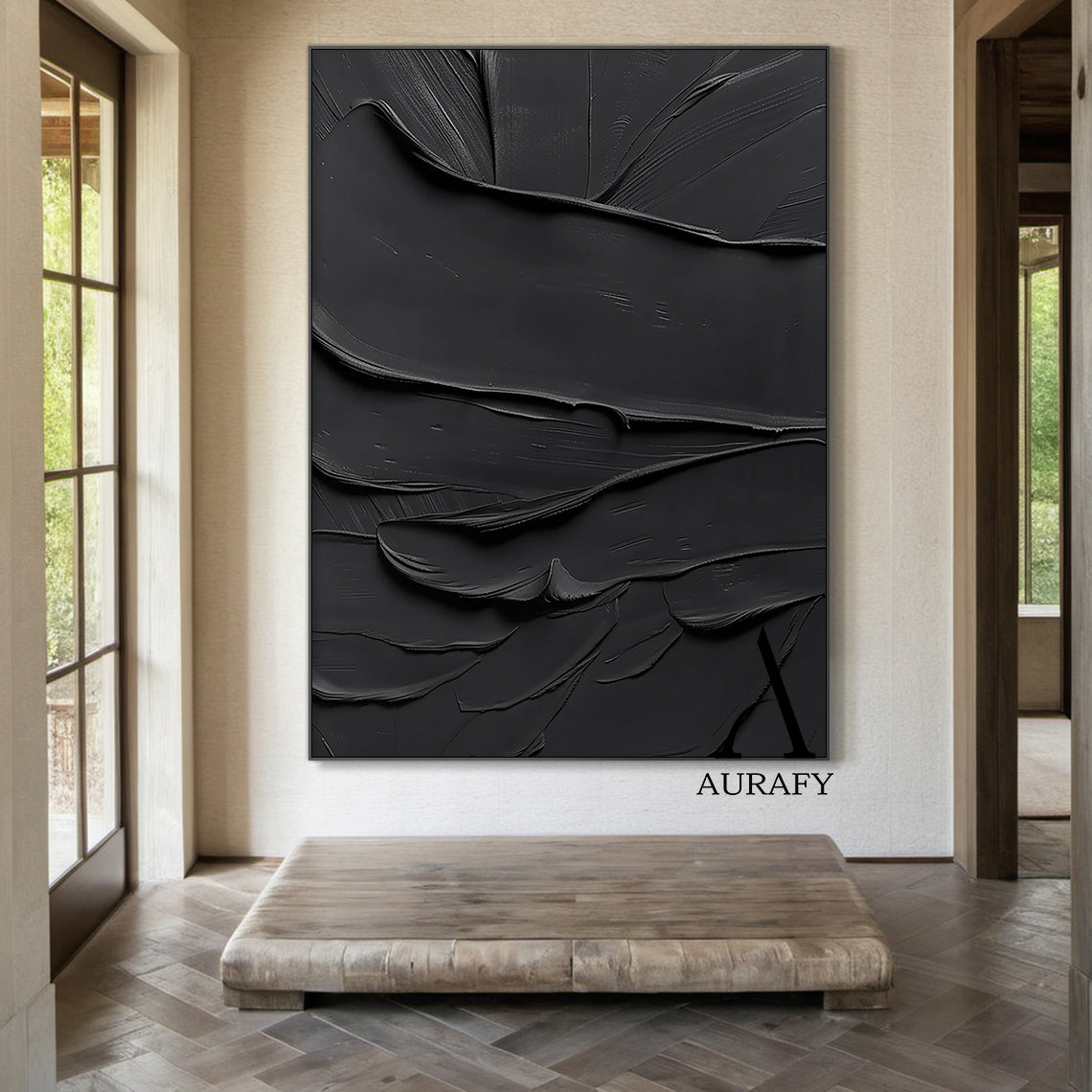 Black minimalist textured abstract wall art, featuring thick impasto knife-scraped matte black paint strokes with natural flowing undulations, raised ridges and subtle brush marks. All light and shadow variations come from the dimensional texture's light reflection difference, no extra pigments are added, with a tiny AURAFY brand logo at the bottom right corner, suitable for wabi-sabi, Japandi, modern industrial interior decor.