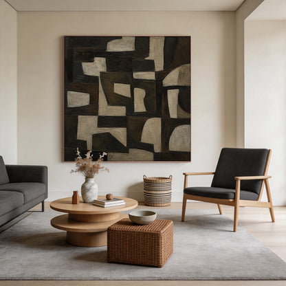 Brown 3D textured impasto abstract geometric canvas wall art AURA707 real installation scene display, features muted earthy brown tones ranging from near-black dark brown, warm mid-brown to light beige gray. The artwork consists of interlocking irregular geometric shapes including angular polygons and softly curved blocks arranged in a well-organized layout, its hand-painted thick impasto technique forms a raised tactile surface with clear visible brushstrokes, the real shot presents its excellent decorativ