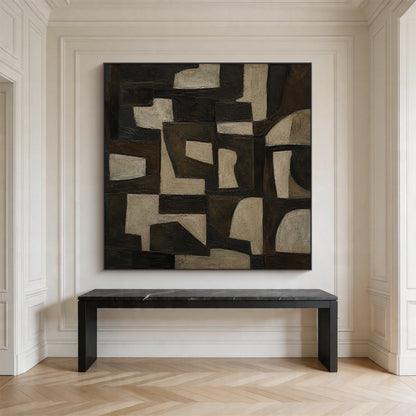 Brown 3D textured impasto abstract geometric canvas wall art AURA707, features muted earthy brown tones ranging from near-black dark brown, warm mid-brown to light beige gray. The composition is made of interlocking irregular geometric shapes, including angular polygons and softly curved blocks arranged in a well-organized layout. The hand-painted thick impasto technique creates a raised, tactile surface with clear visible brushstrokes, ideal for wabi-sabi, Japandi, minimalist and mid-century modern interio