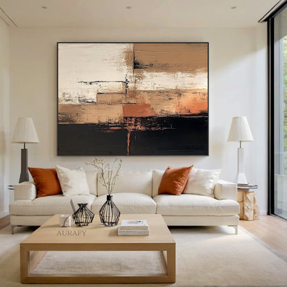 Abstract Brown Black Textured Canvas Art (AURA642) Real Scene Display, general abstract style artwork with layered irregular blocks of deep black, varying warm brown shades, soft off-white, subtle terracotta accents, divided by uneven dark lines. Thick impasto paint application, rough vertical brushstrokes, blurred feathered color transitions deliver a strong tactile, hand-painted textured visual effect, presented hung on a neutral plain wall to show the actual decor effect, perfectly suitable for modern ne