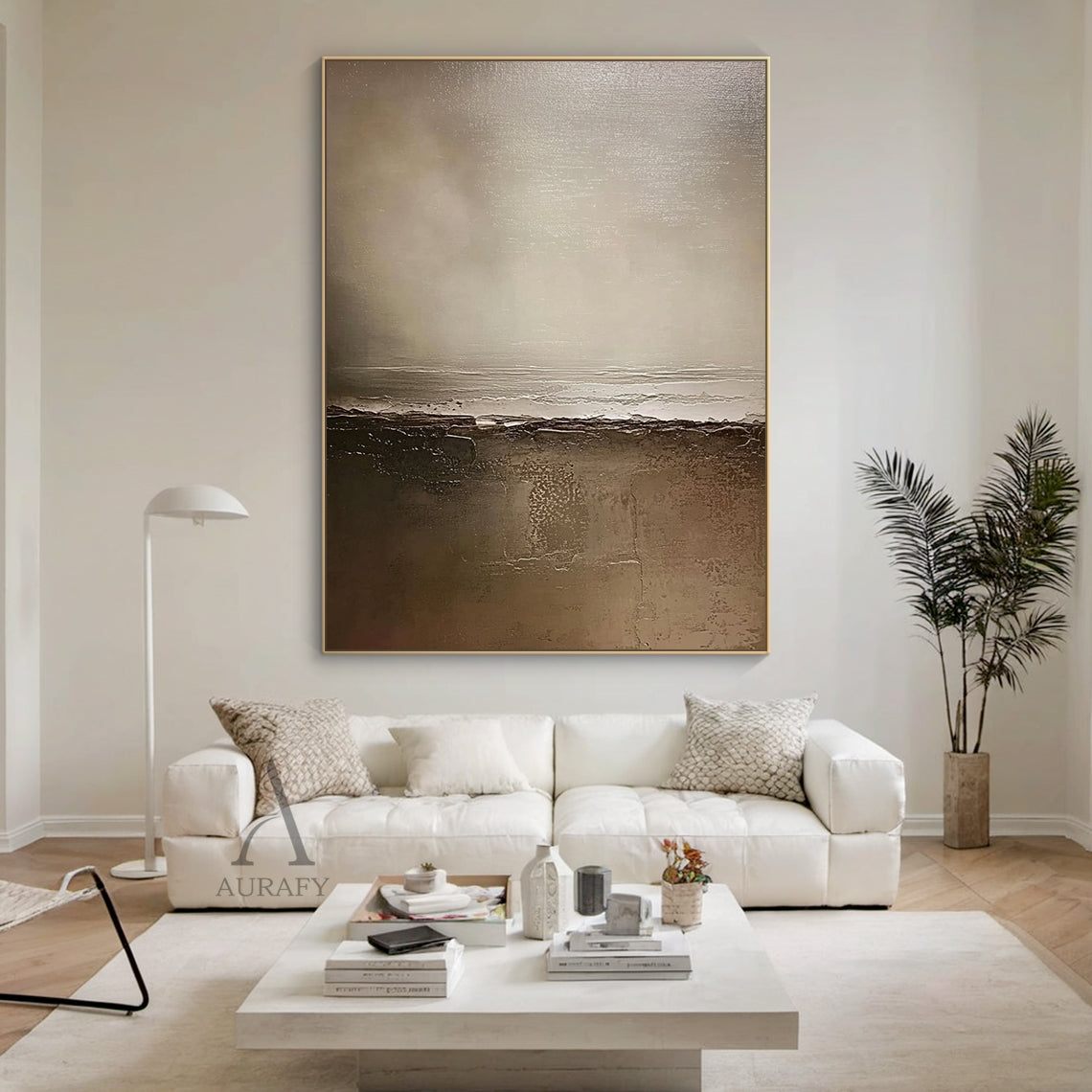 AURA649 General Abstract Brown Artwork, real residential scene display of the modern organic sculpted canvas wall piece mounted on interior wall. Non-representational abstract art with monochromatic earthy brown palette ranging from deep chocolate, warm taupe, soft beige to muted gray-brown, features 3D sculpted impasto layers with subtle cracked details, soft tonal transitions create diffused light effect and depth, perfectly integrates with Japandi, minimalist, wabi-sabi home decoration styles, adding a w