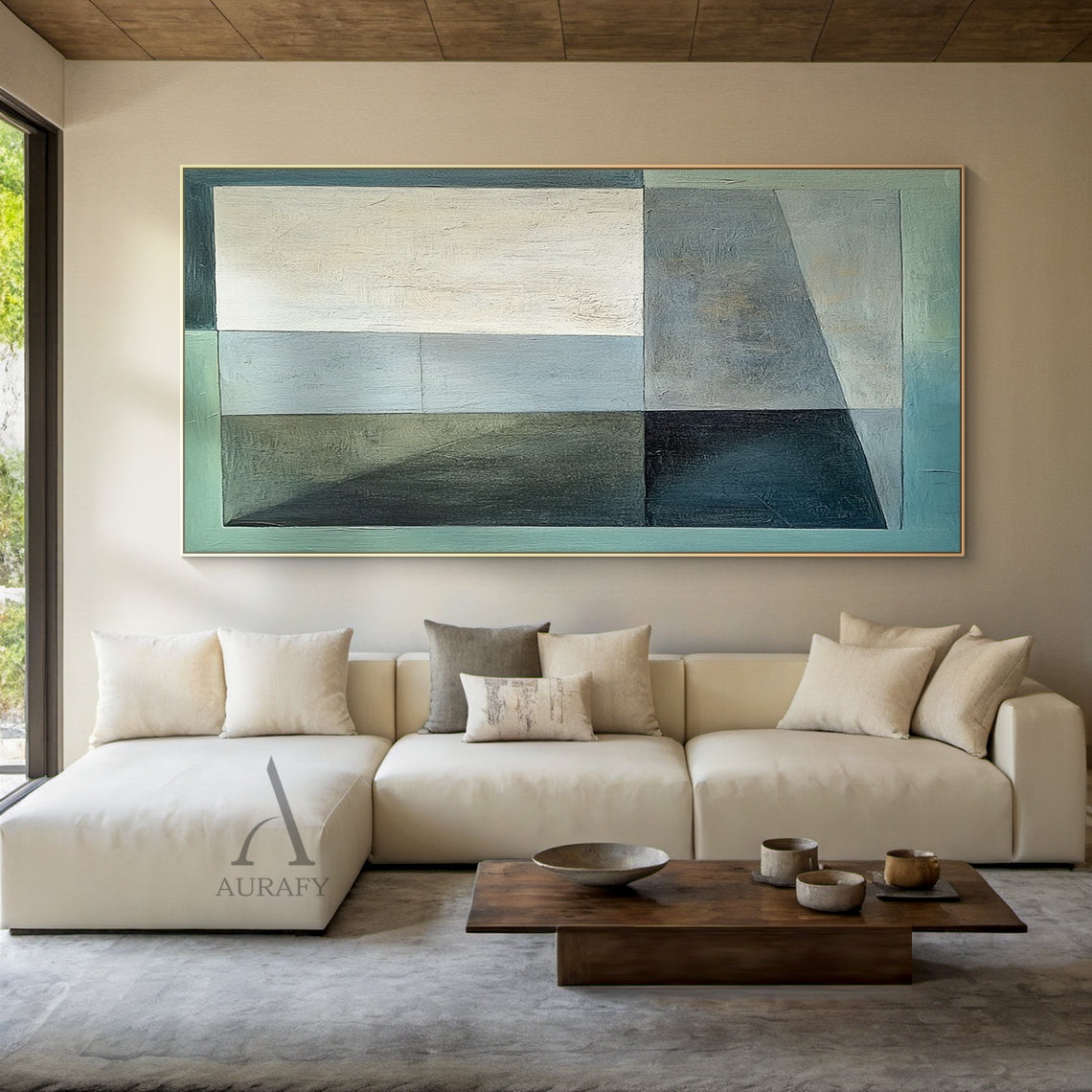 Geometric abstract hand-painted oil painting with distinct tactile brushstroke texture, composed of irregular rectangular and asymmetrical color blocks in layered light green, dark green, warm beige, muted gray-blue, dark gray and light gray. Blocks are separated by clear straight and slanted lines, features a low-saturation earthy color palette and well-balanced visual layout, conveys a minimalist calm aesthetic, this display shot shows it hung above the solid wood headboard of a minimalist bedroom, and it