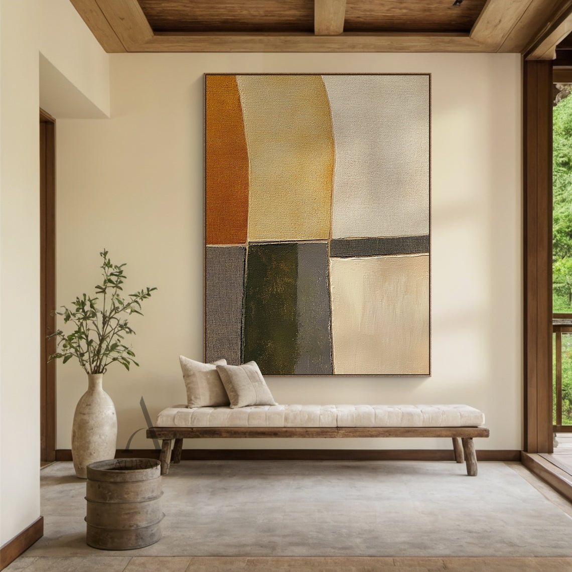 Scene display shot of AURA405 hand-painted brown geometric abstract canvas wall art, shown installed on an interior wall as a living space decorative accent, features patchwork of curved and angular geometric color blocks in warm burnt sienna, soft sand beige, olive green, charcoal gray and off-white earthy tones. Visible thick impasto brush stroke texture and canvas grain, edges of color blocks have both sharp division lines and soft blurred transitions, the warm, calm, minimalist tactile artwork fits well