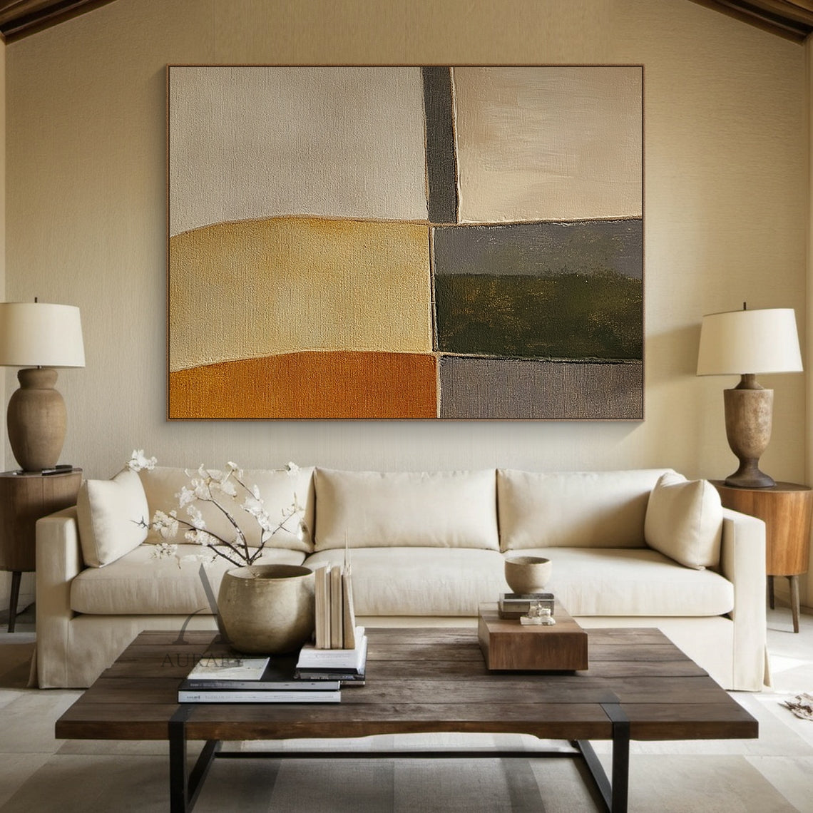 Scene display shot of AURA405 hand-painted brown geometric abstract canvas wall art, shown installed on an interior wall as a living space decorative accent, features patchwork of curved and angular geometric color blocks in warm burnt sienna, soft sand beige, olive green, charcoal gray and off-white earthy tones. Visible thick impasto brush stroke texture and canvas grain, edges of color blocks have both sharp division lines and soft blurred transitions, the warm, calm, minimalist tactile artwork fits well