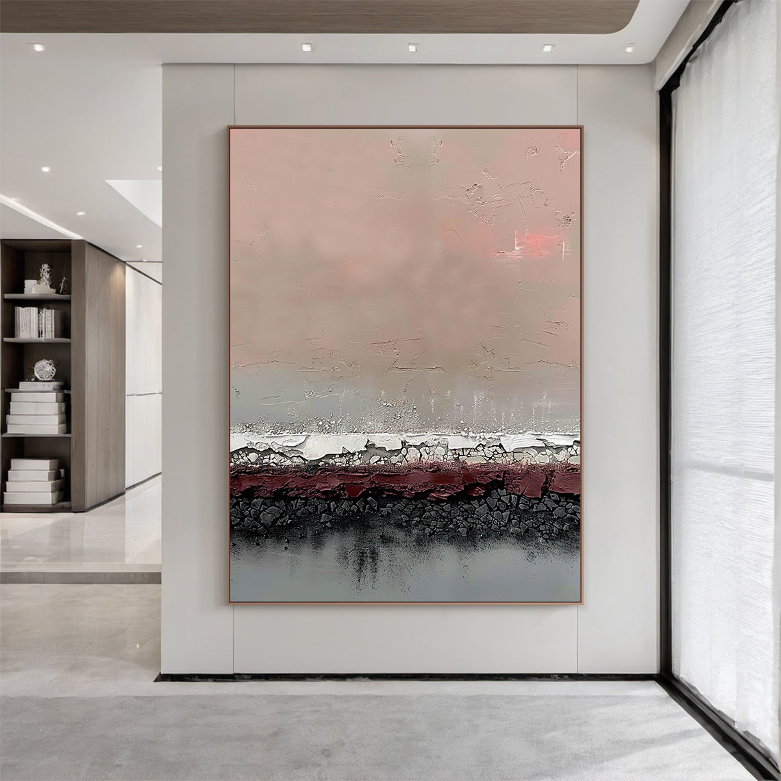 Vertical abstract art painting with layered textures: soft blush pink upper section, muted taupe gradient, textured white-silver crackle band, deep burgundy red layer, charcoal black crackle base, and cool gray bottom. Framed in warm metallic border, displayed on light gray wall in modern minimalist interior—ideal statement decor for contemporary living rooms, entryways, or bedroom accent walls. This piece blends earthy tones with tactile details, perfect for elevating modern home interiors with artistic ch