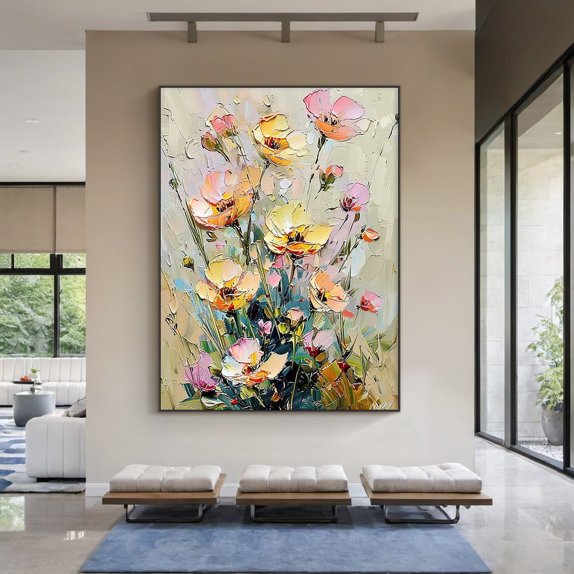 Impasto palette knife oil painting of wild clustered florals, presented in a real modern organic home styling scene. The artwork features fully bloomed, half-opened and budding flowers in soft buttery yellow, blush pink, light peach shades, paired with muted sage green stems and foliage against a neutral creamy beige textured background. Thick raised paint strokes create a distinct tactile hand-painted texture, following the impressionist wabi-sabi decorative style, which matches perfectly with light wood f