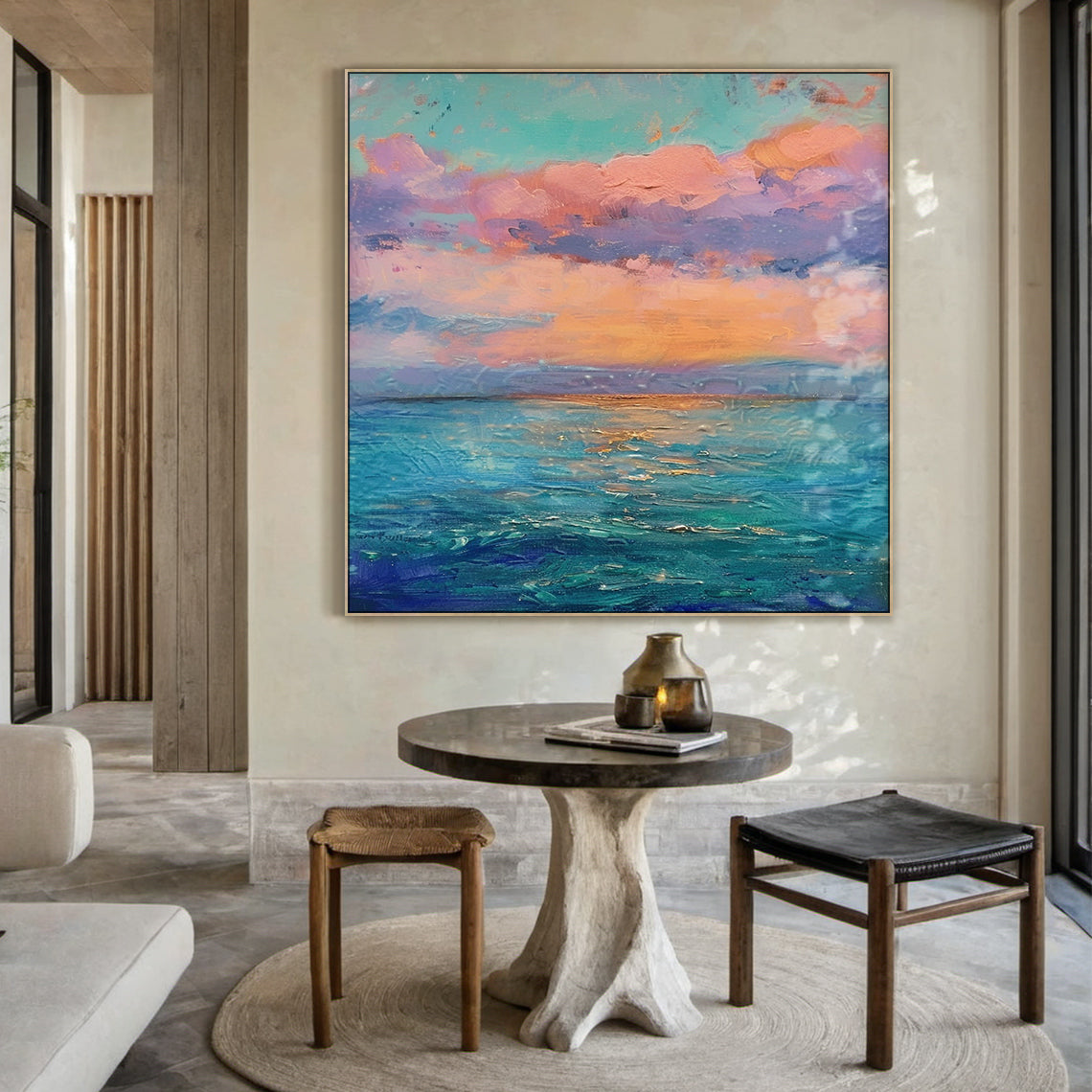 Impressionist thick impasto coastal sunset vertical canvas wall art, soft pink, peach, lavender gradient clouds under pale turquoise sky, warm orange sunset glow above layered indigo, teal, light blue ocean with golden light reflections, textured palette knife strokes, dreamy pink blue landscape painting for modern home decor AURA712
