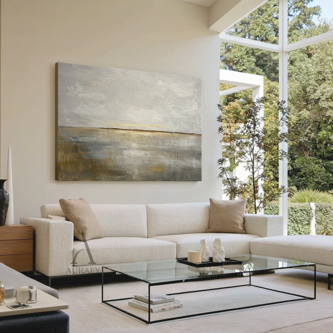 General abstract Japandi style palette knife impasto canvas wall art AURA625, displayed mounted on the textured off-white limewash wall above a minimalist light oak sideboard in the scene shot, the painting's soft misty gray upper and warm dawn beige lower tones coordinate seamlessly with surrounding plain ceramic decor and light linen textiles, the thick raised impasto strokes present distinct tactile layering under soft ambient ceiling light, offering intuitive decor reference for modern Nordic minimalist