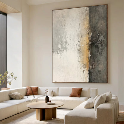 AURA638 Japandi Minimalist Wabi-sabi Abstract Textured Wall Art, real-scene display of this abstract expressionism artwork installed above the sofa in a warm Japandi-style living room with log furniture, with neutral color palette of off-white, layered light grey, soft beige and deep black, features visible vertical brush strokes, scuffed scratched mottled texture, thick pigment layers, grainy dark finish on the right section, no figurative elements, its calm understated textured aesthetic can perfectly int