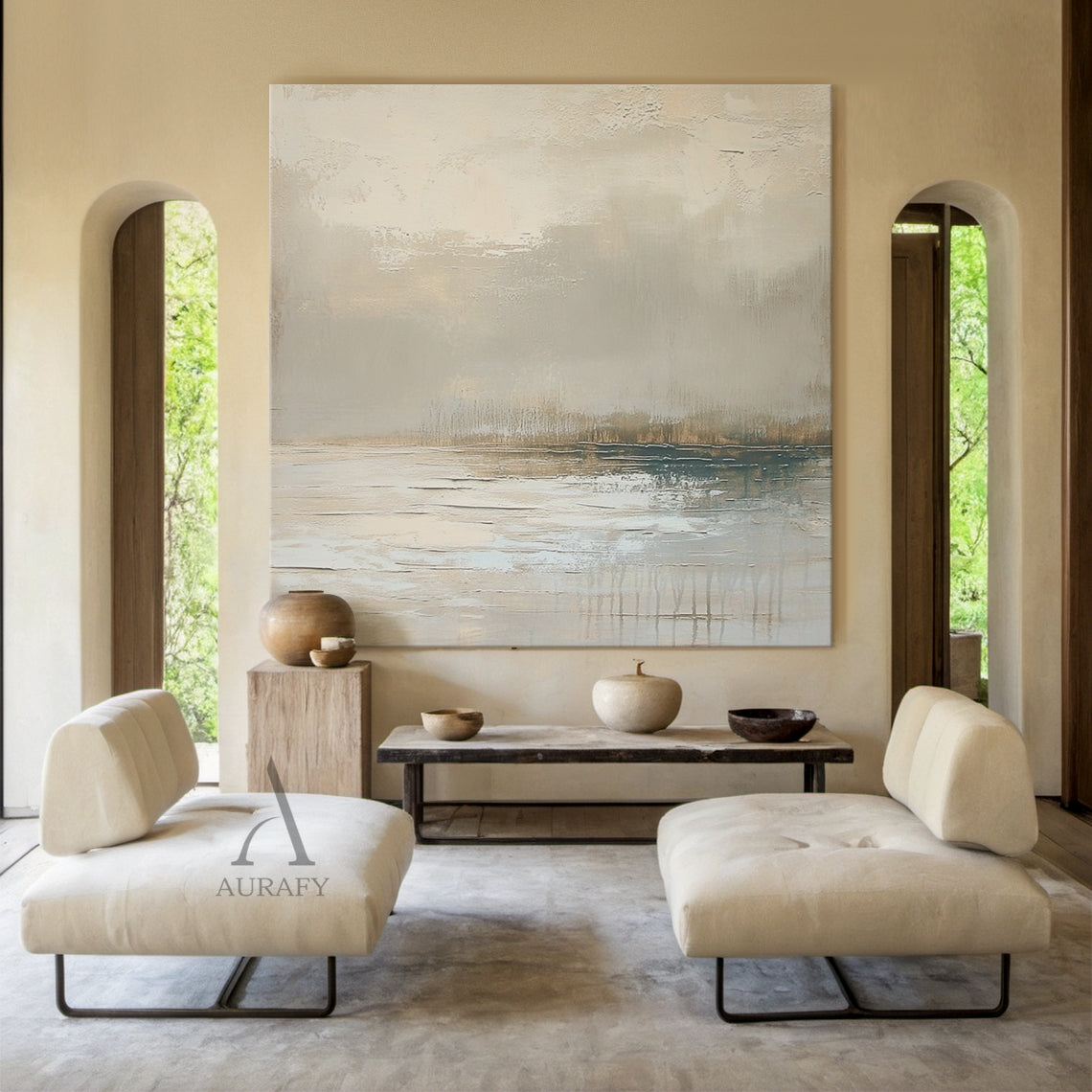 Abstract Gray Landscape Textured Plaster Impasto Scraped Japandi Minimalist Luxe Wall Art (AURA671) Interior Decor Scene Display. The artwork retains its original core design: upper part has mottled thick impasto scraped texture mimicking hazy mist and cloud layers, lower part adopts smooth strokes with faint vertical lines resembling calm water reflections, color palette covers gradient grays, muted beiges, soft light browns with subtle cool blue accents in the lower reflective section, no sharp color cont