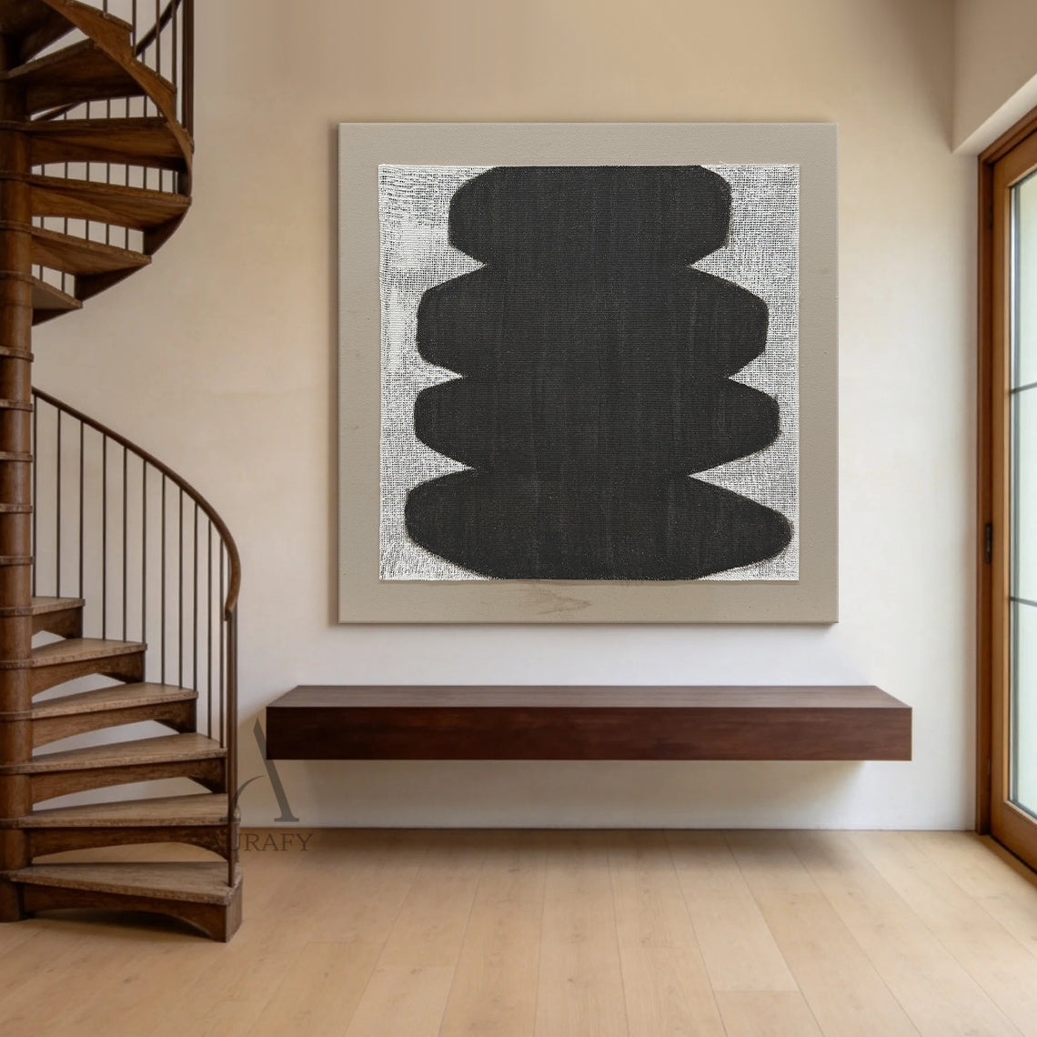 Minimalist abstract Japandi wabi-sabi wall artwork AURA727 staged in a sunlit cozy Japandi open-concept dining nook, square raw woven canvas with clear grid texture is mounted on warm beige limewash textured wall between two light oak floating shelves, features stacked soft curved matte black organic form with no sharp edges, uses monochrome black, white and neutral gray color palette, canvas weave texture is visible through both painted and unpainted areas, paired with a light taupe matte border, styled al