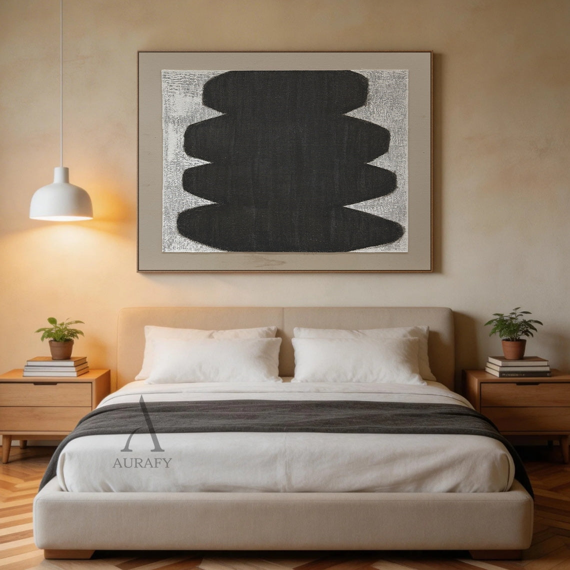 Minimalist abstract Japandi wabi-sabi wall artwork AURA727, square raw woven canvas with clear grid texture, features stacked soft curved matte black organic form with no sharp edges, monochrome black, white and neutral gray color palette, canvas weave texture visible through both painted and unpainted areas, set against a light taupe matte border, tactile neutral decor piece for calm curated modern home spaces.
