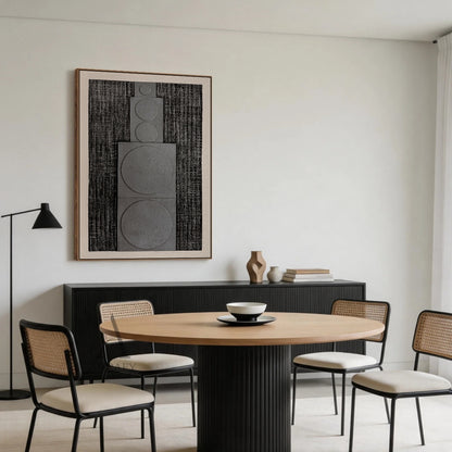 Horizontal monochrome black gray 3D textured geometric abstract canvas wall art real installation scene shot (AURA728), features rough dark near-black ridged woven-like background, slightly raised matte light gray rectangular panels with graduated circular forms growing in size from left to right, framed by soft light off-white blank border, minimalist Japandi wabi-sabi wall decor presented in actual warm log-style dining room space to show space matching effect