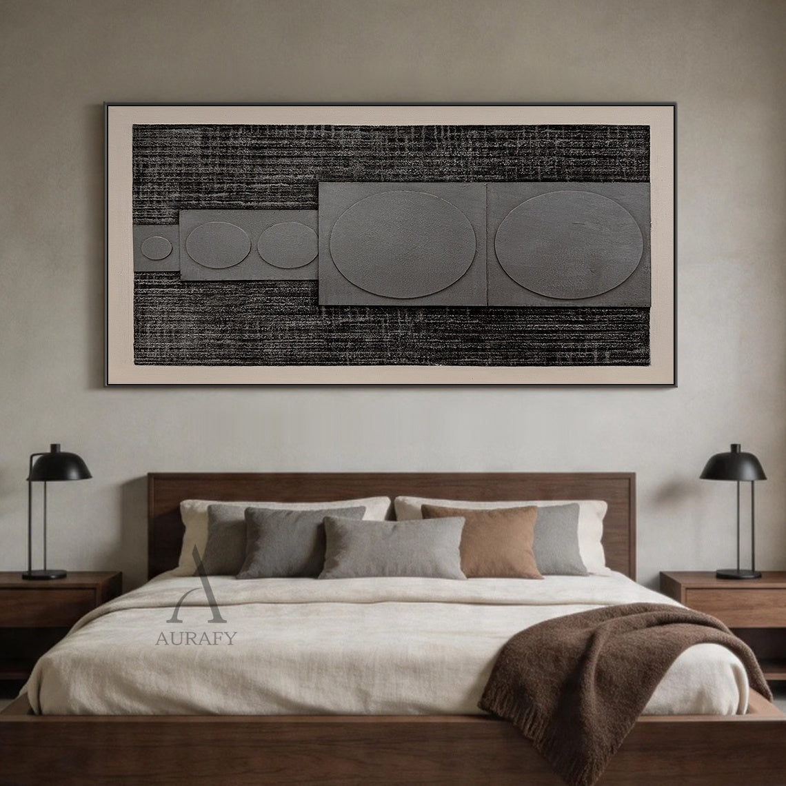 Horizontal monochrome black gray 3D textured geometric abstract canvas wall art real installation scene shot (AURA728), features rough dark near-black ridged woven-like background, slightly raised matte light gray rectangular panels with graduated circular forms growing in size from left to right, framed by soft light off-white blank border, minimalist Japandi wabi-sabi wall decor presented in actual warm log-style dining room space to show space matching effect