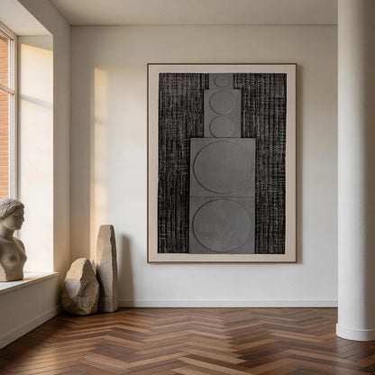 Horizontal monochrome black gray 3D textured geometric abstract canvas wall art (AURA728), features rough dark near-black ridged woven-like background, slightly raised matte light gray rectangular panels with graduated circular forms growing in size from left to right, framed by soft light off-white blank border, minimalist Japandi wabi-sabi wall decor